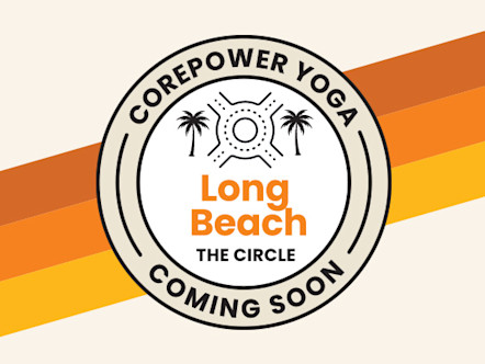 Tan and white CorePower Yoga coming soon target logo with orange Long Beach lettering in the center and a traffic circle icon to indicate the area