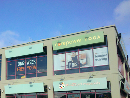 CorePower Yoga Berkley West studio's exterior logo signage on second floor