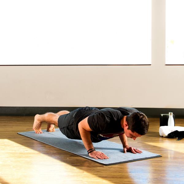 Chaturanga Dandasana -Four-Limbed Staff Pose variation with yoga