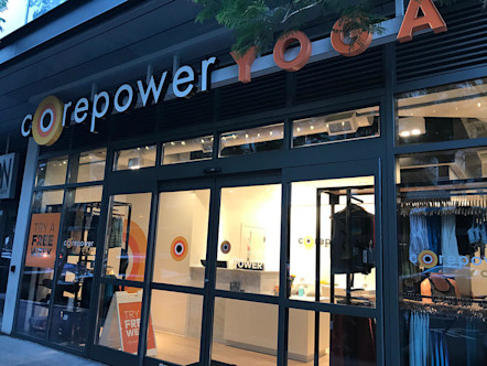CorePower Yoga sign above fully windowed walls and entryway 