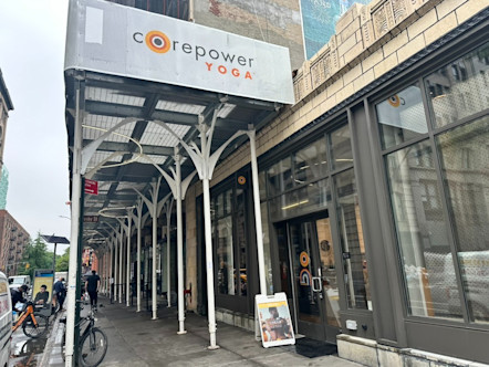 NoHo CorePower Yoga retail space with silver CPY signage above the ground floor of the studio space