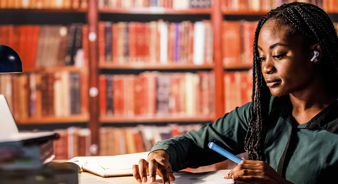 Student studying in library