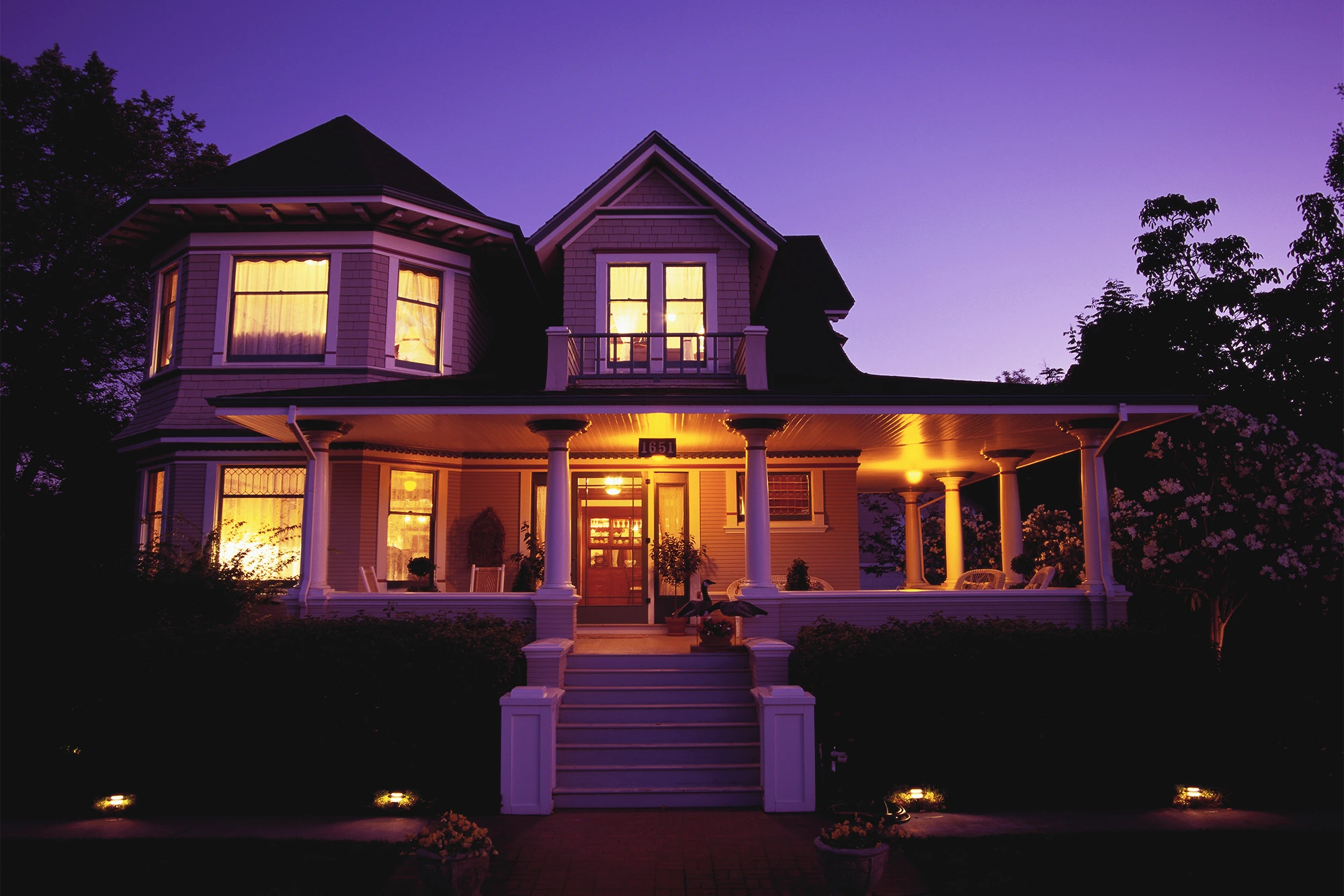 dearborn - house with large porch at night