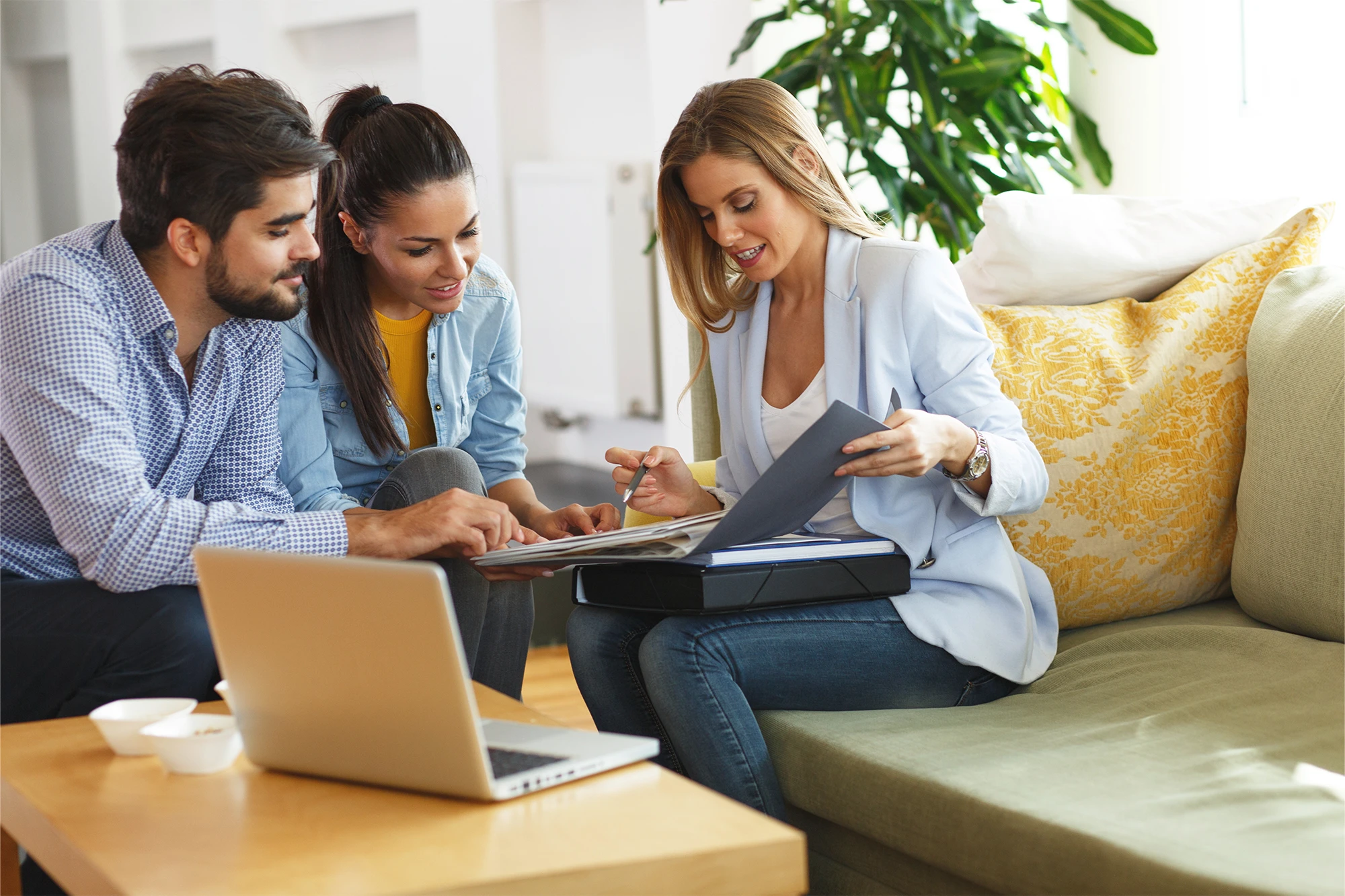 dearborn - woman discussing with couple at home