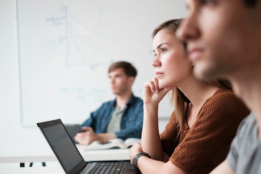 Students In Class With Open Laptops