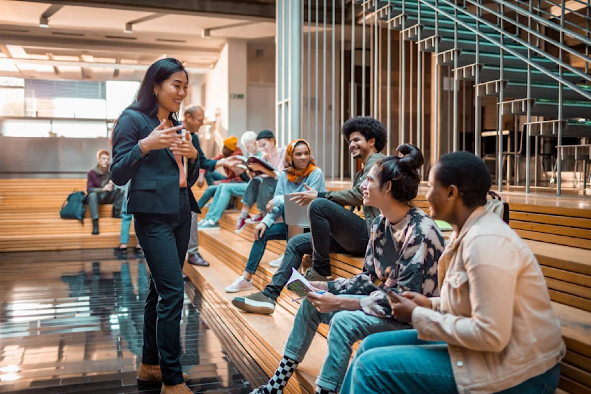group of students and teacher in a university setting