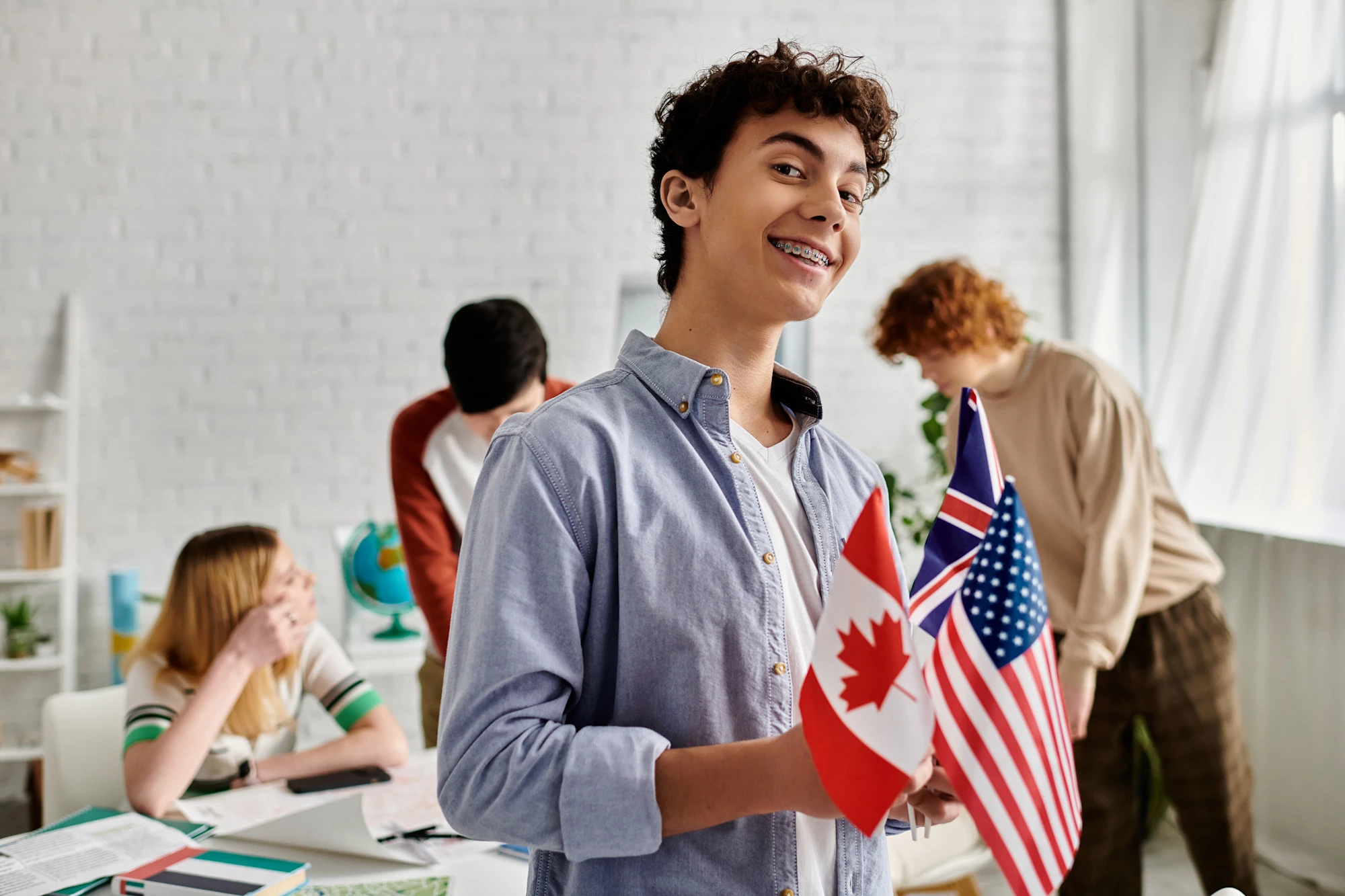 Student holding flags