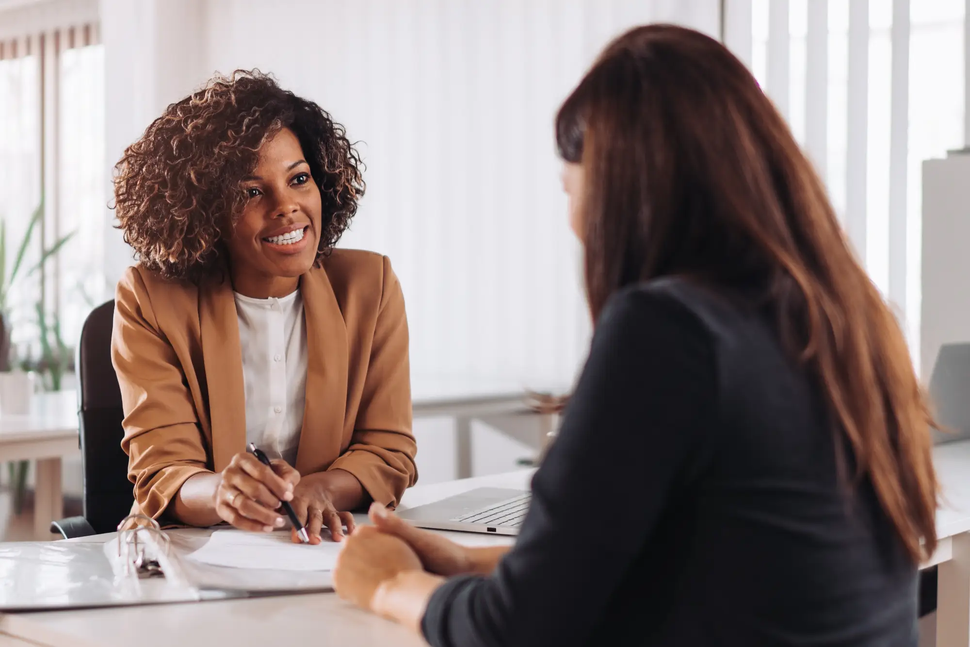 2 women having a discussion