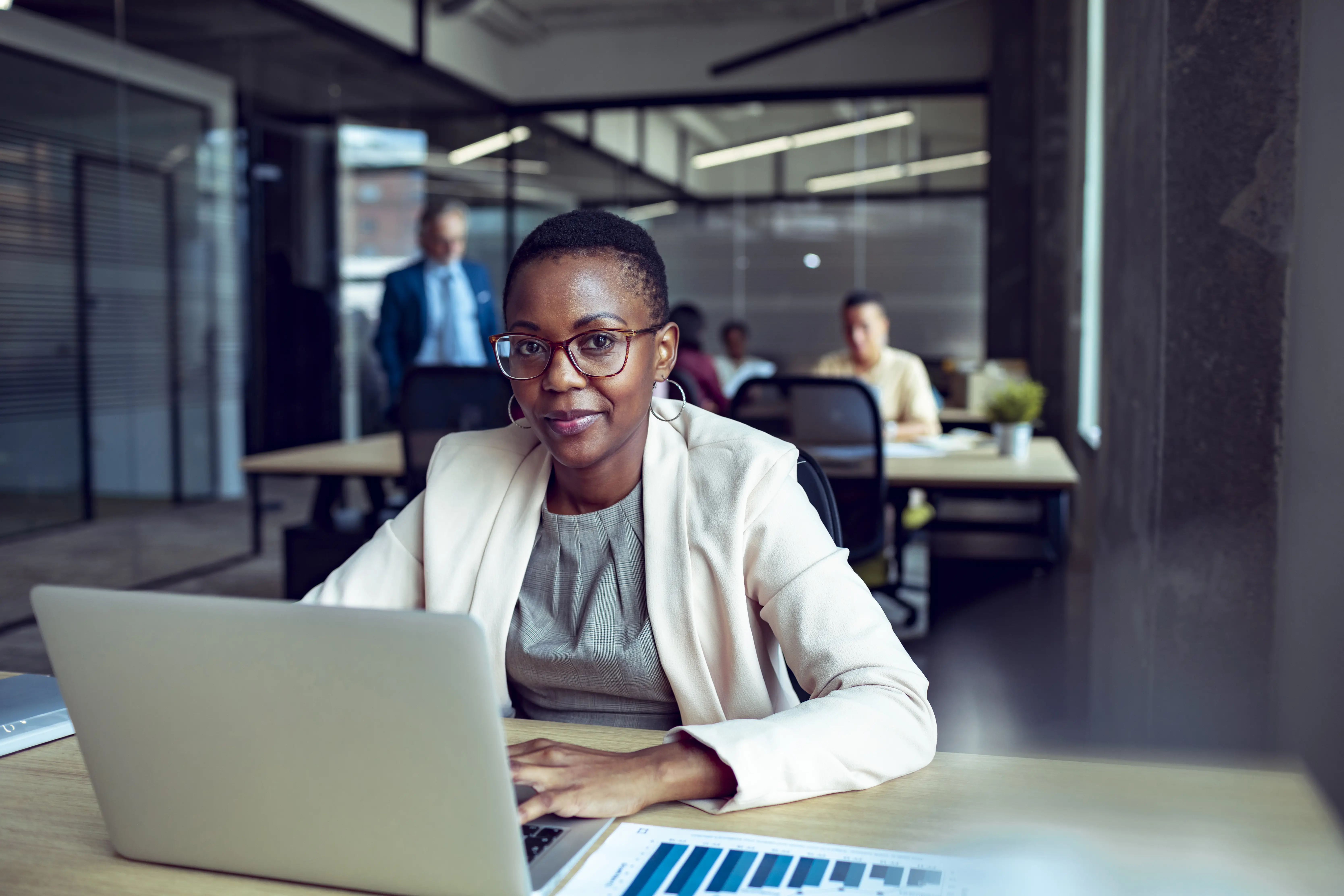 Female businesswoman sitting in front of a laptop