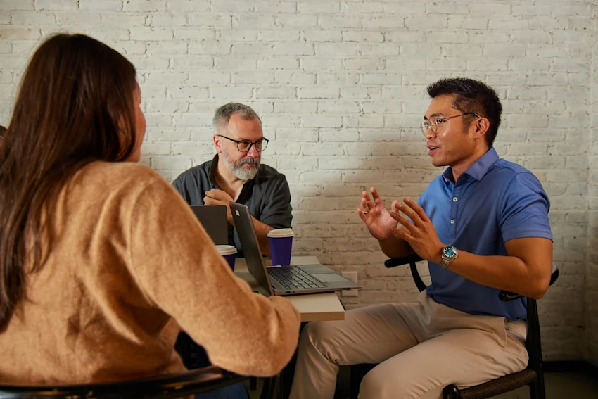 Work With Us - Kaplan International - man and woman meeting