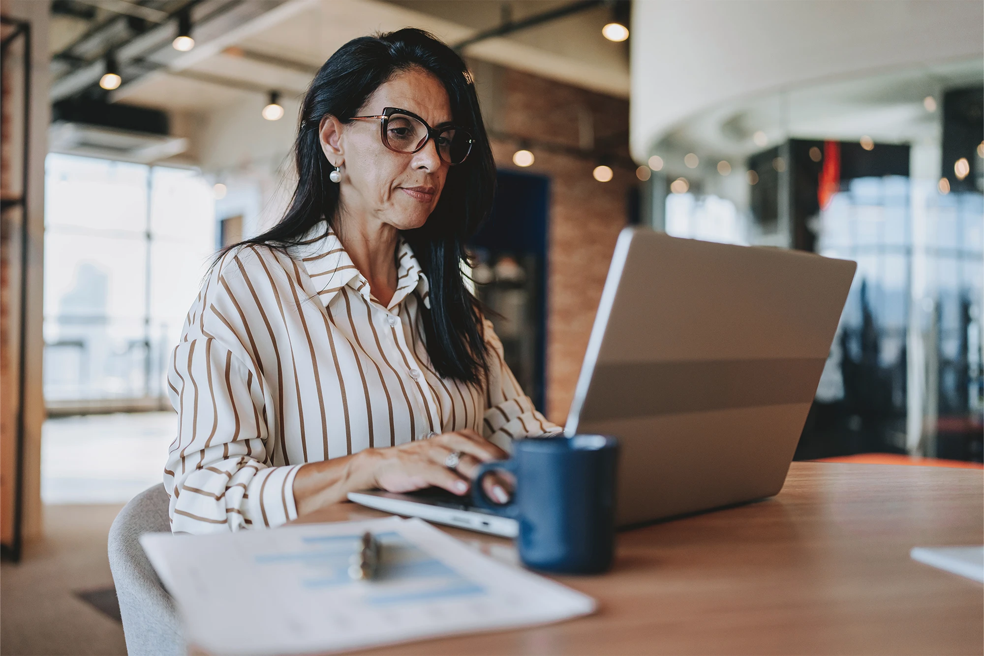 dearborn - woman in office on laptop