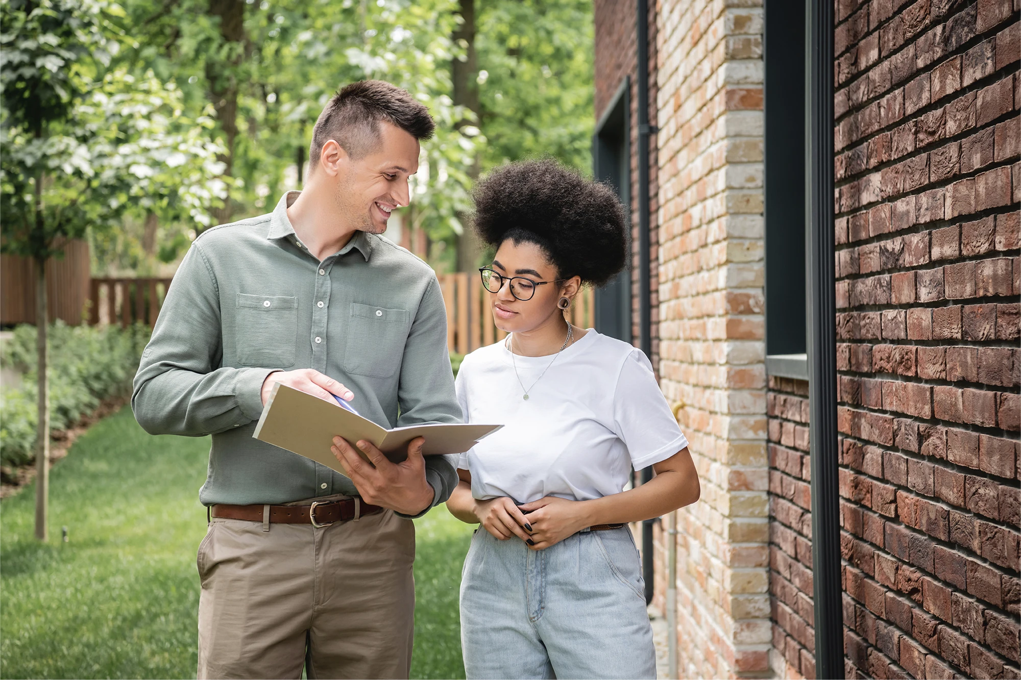 dearborn - woman and man discussing outdoors