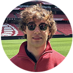 University of Illinois Chicago student, Brett Simon, standing on football field