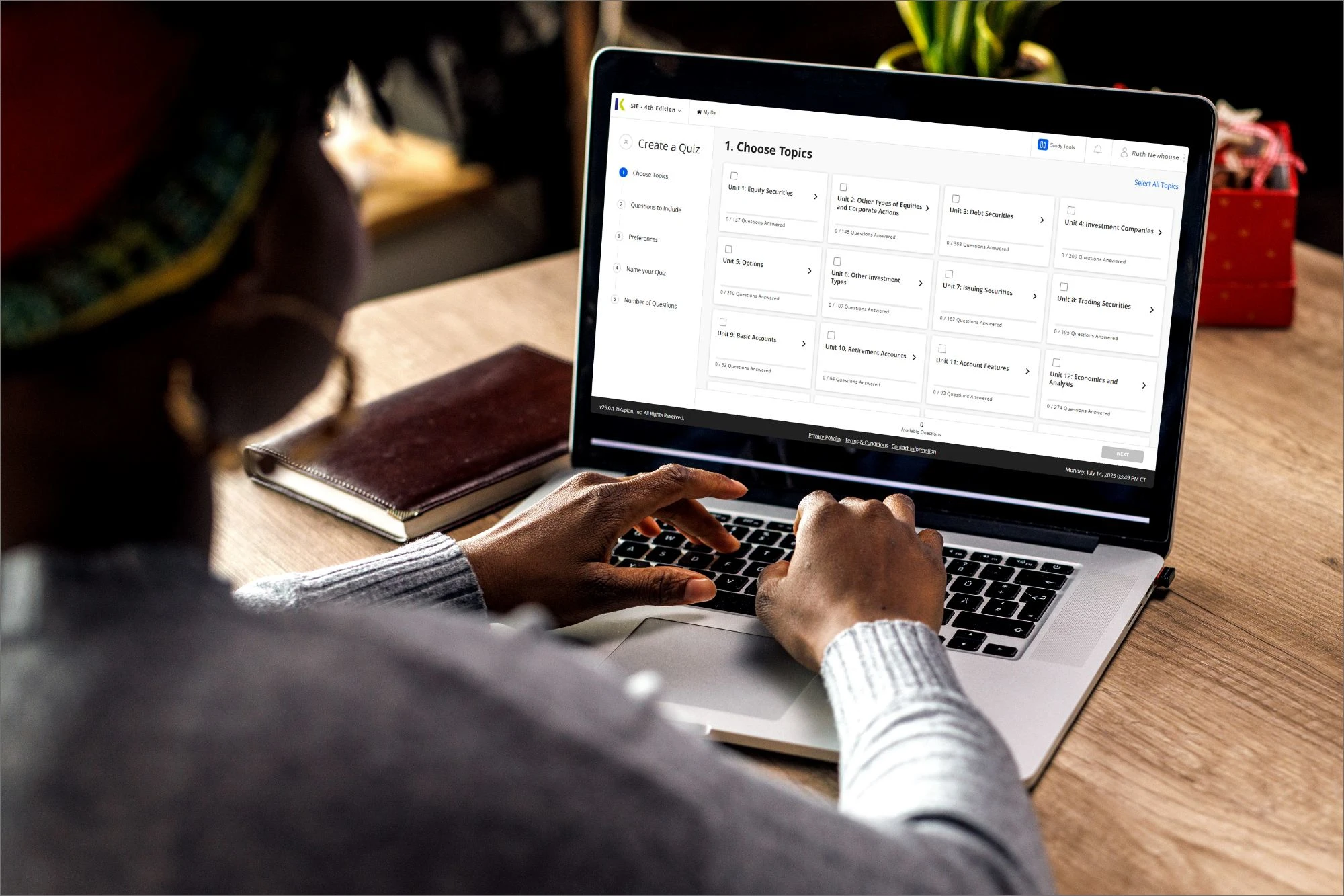 woman preparing for securities exam by looking at securities questions on laptop