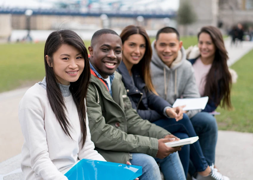 group of 5 students outdoors