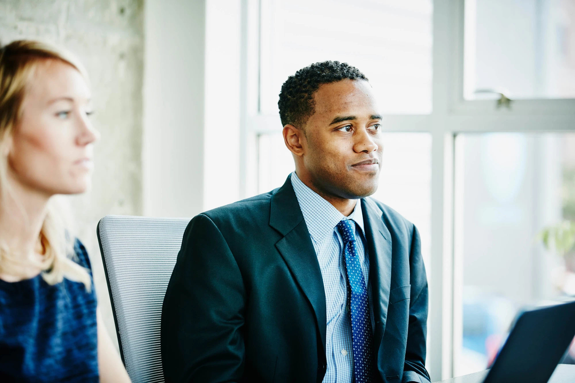 man and woman in business meeting
