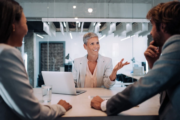 CFFP - woman having discussion with man and woman