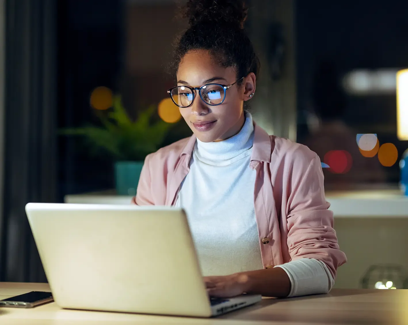 hr employee looking at reporting on computer