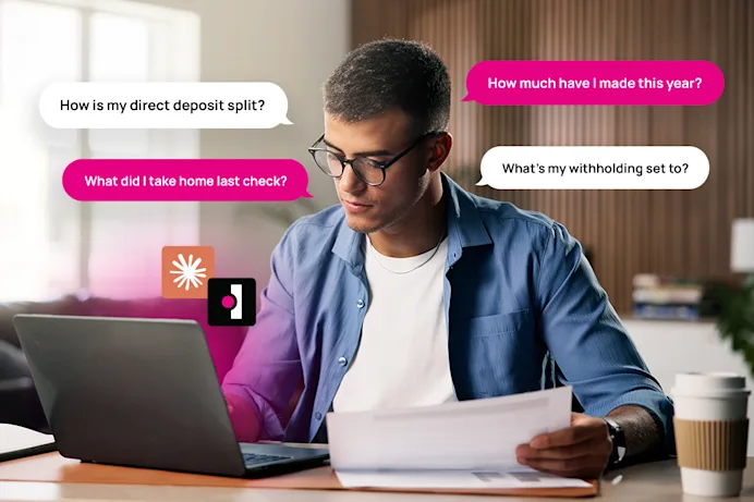 Man looking at a laptop with question bubbles