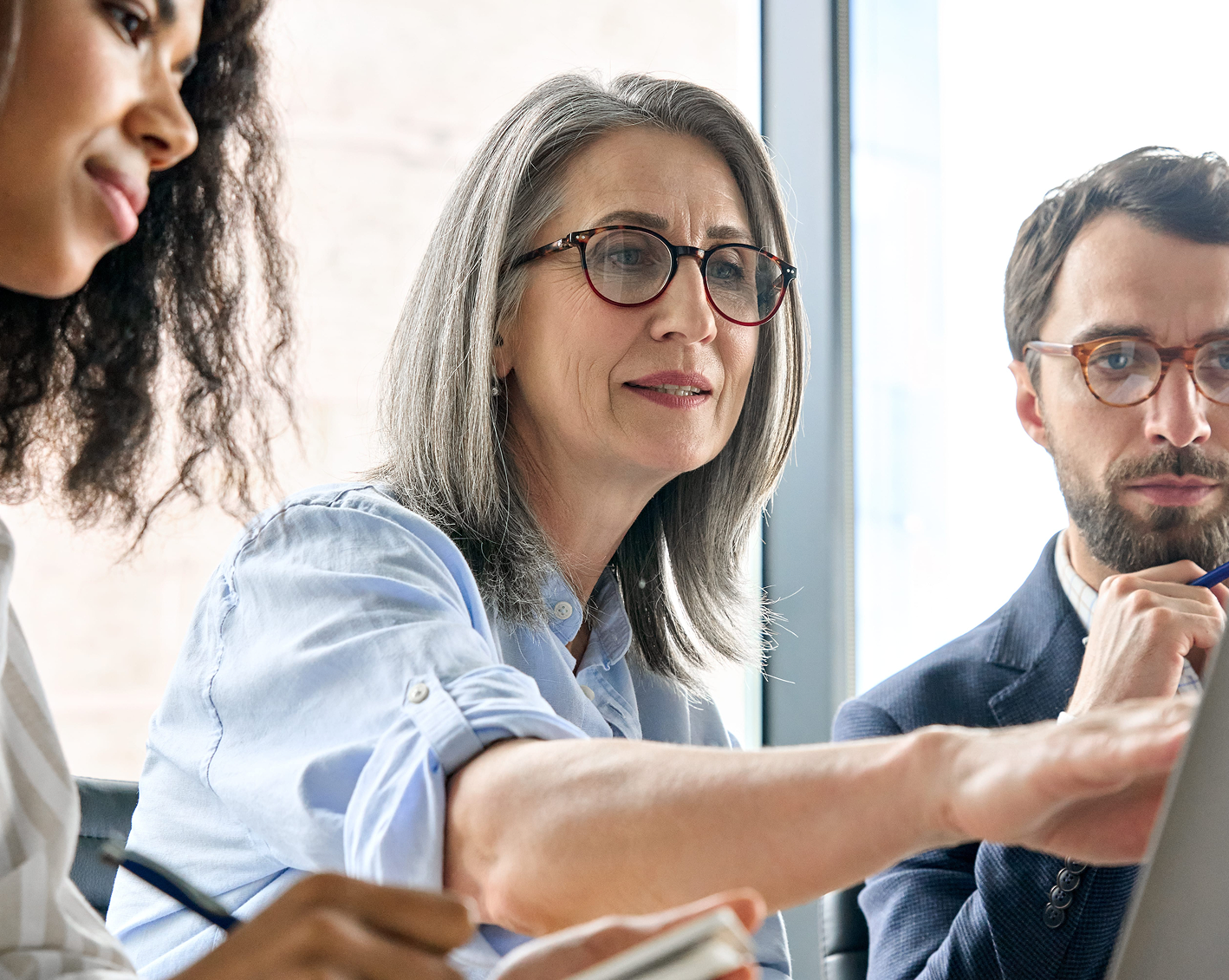 group of hr professionals sourcing qualified candidates