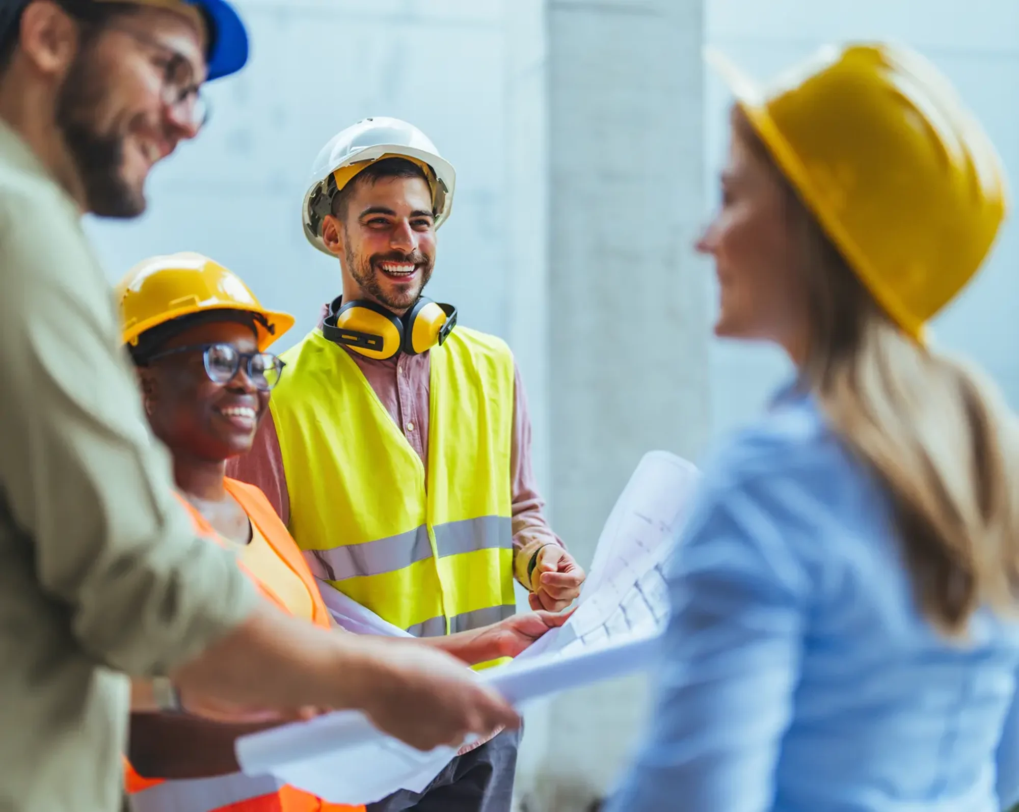 smiling construction workers at job site