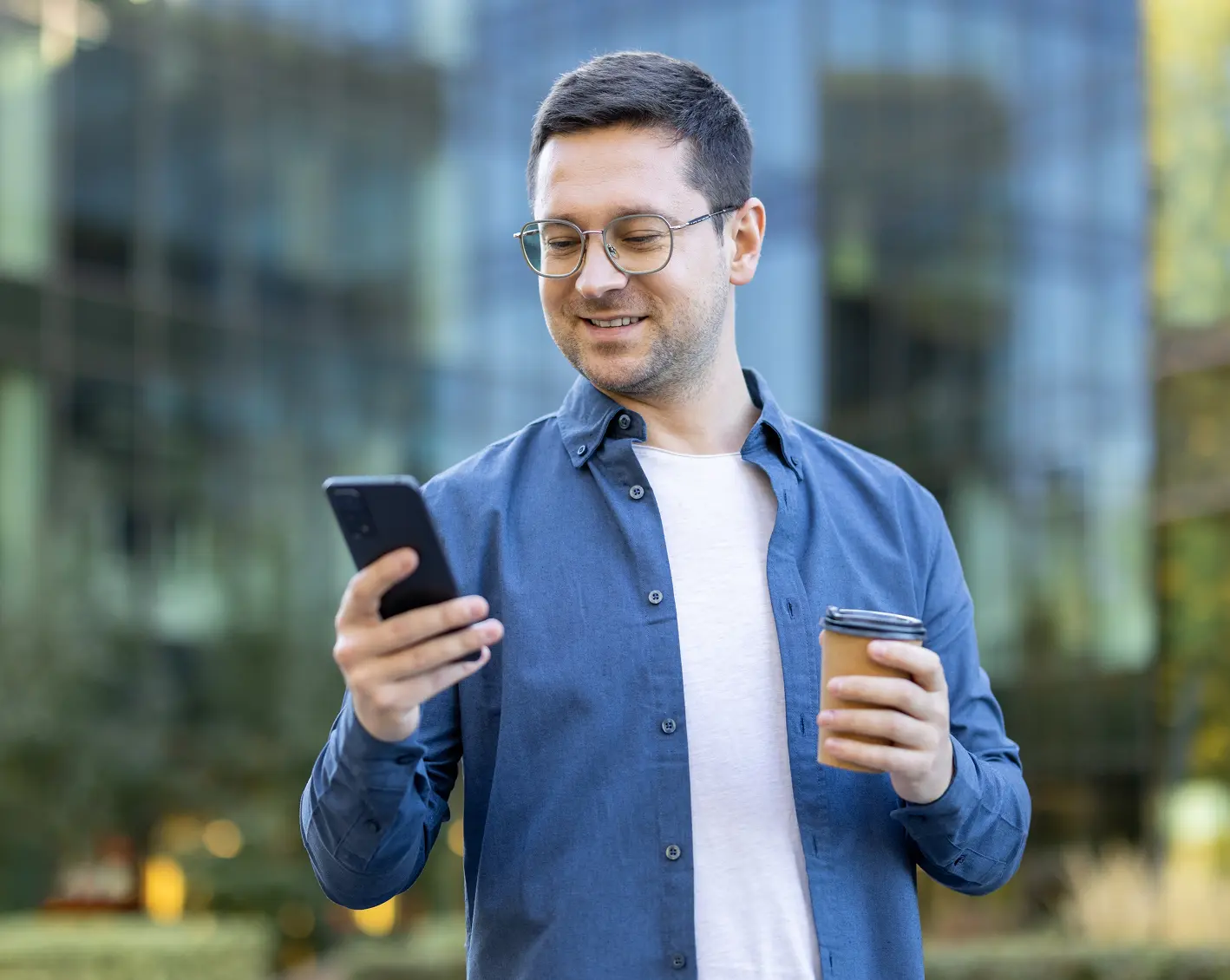 man looking at phone to track time