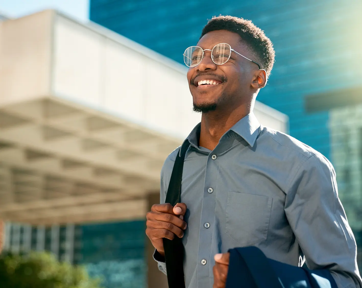 man walking outside an office building