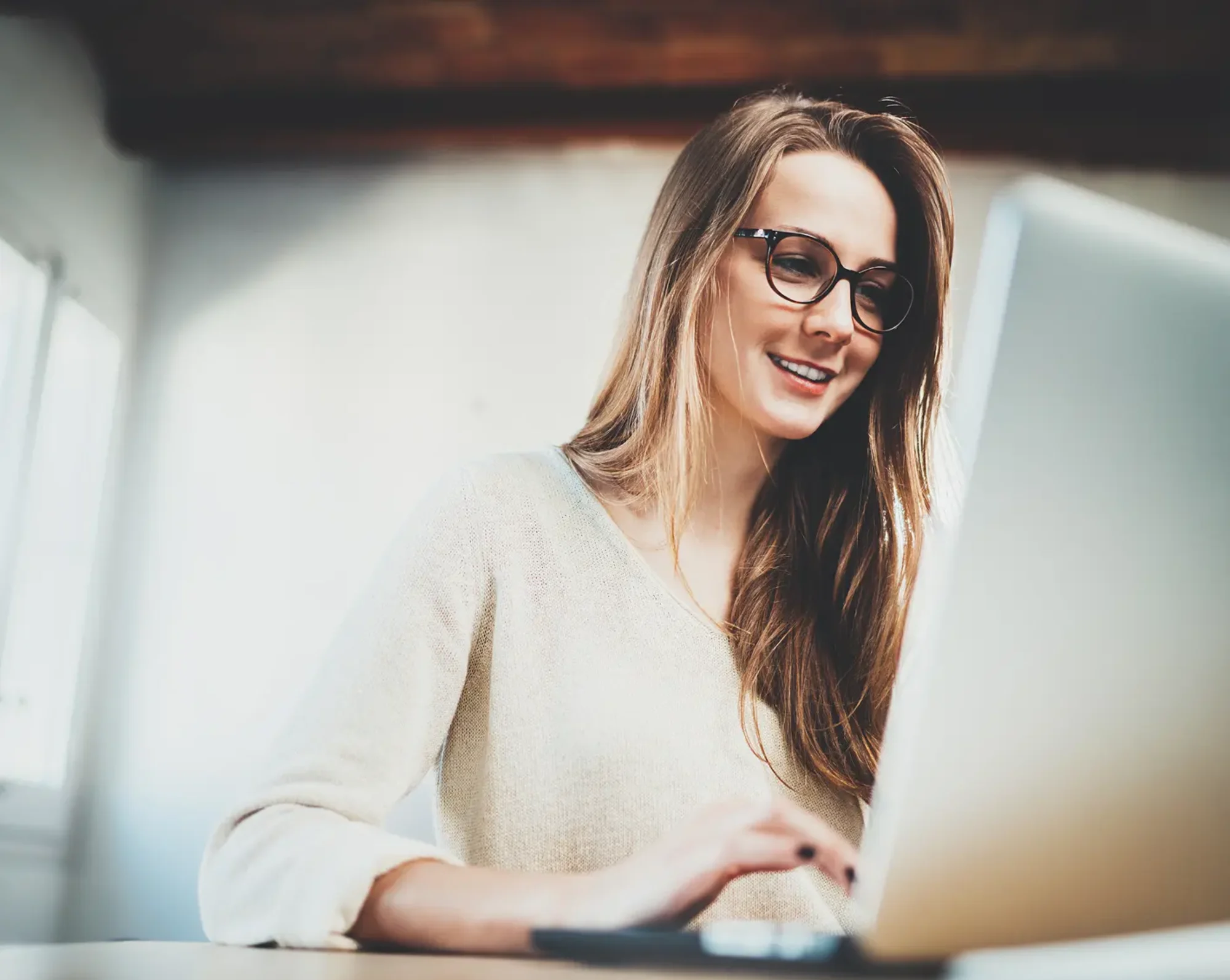 hr admin processing payroll on computer