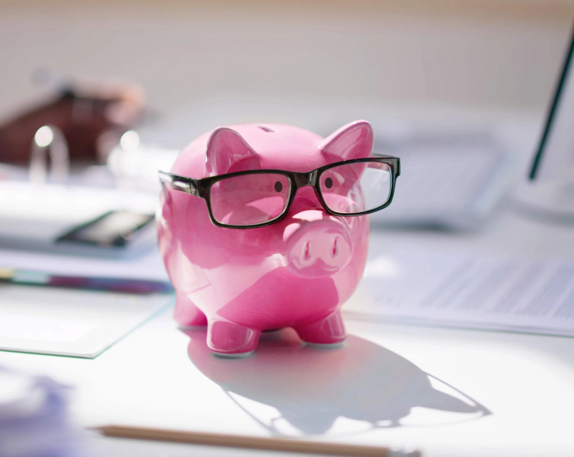 pink piggy bank reminder to save time and money