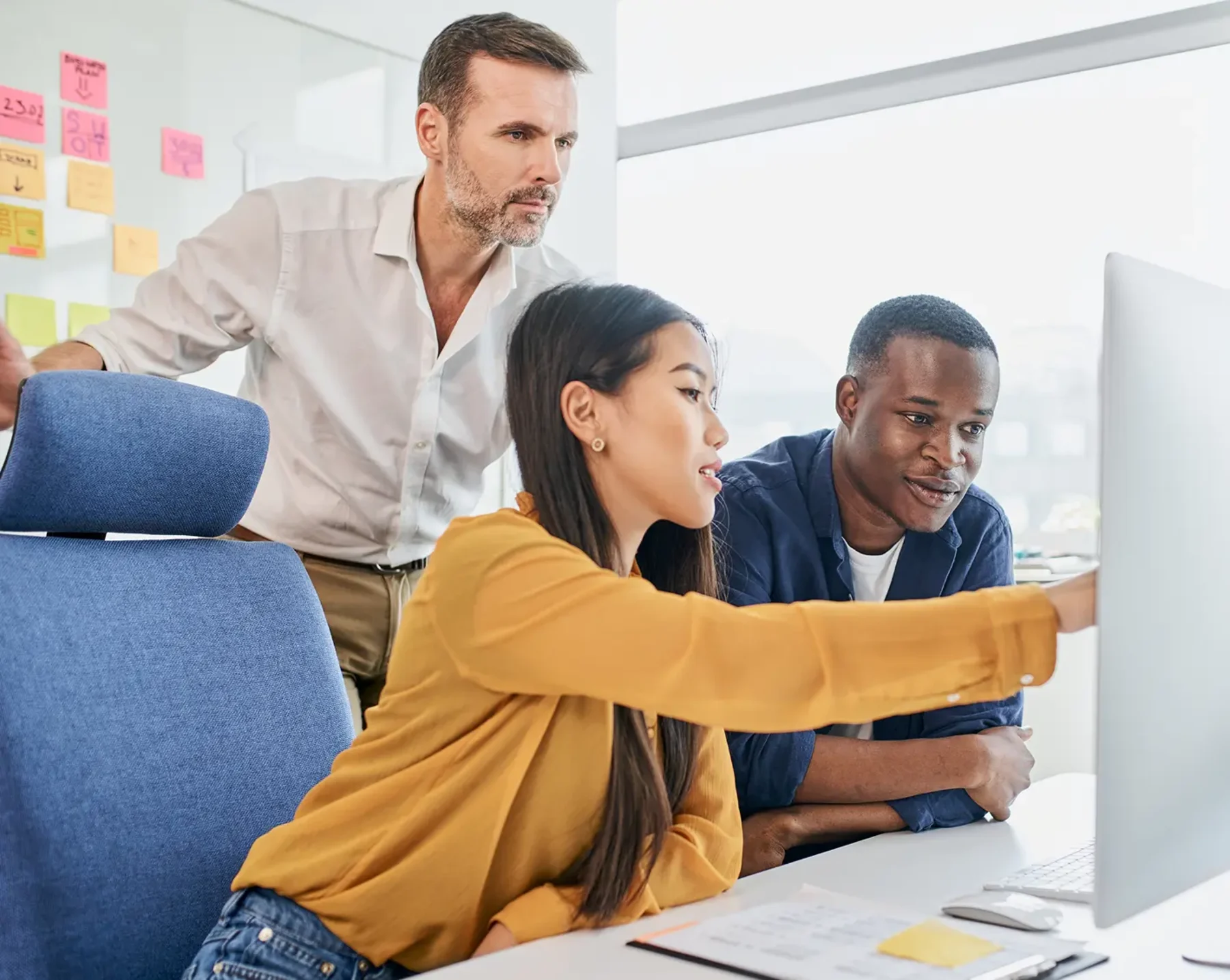 hr at a financial business company looking at data on computer