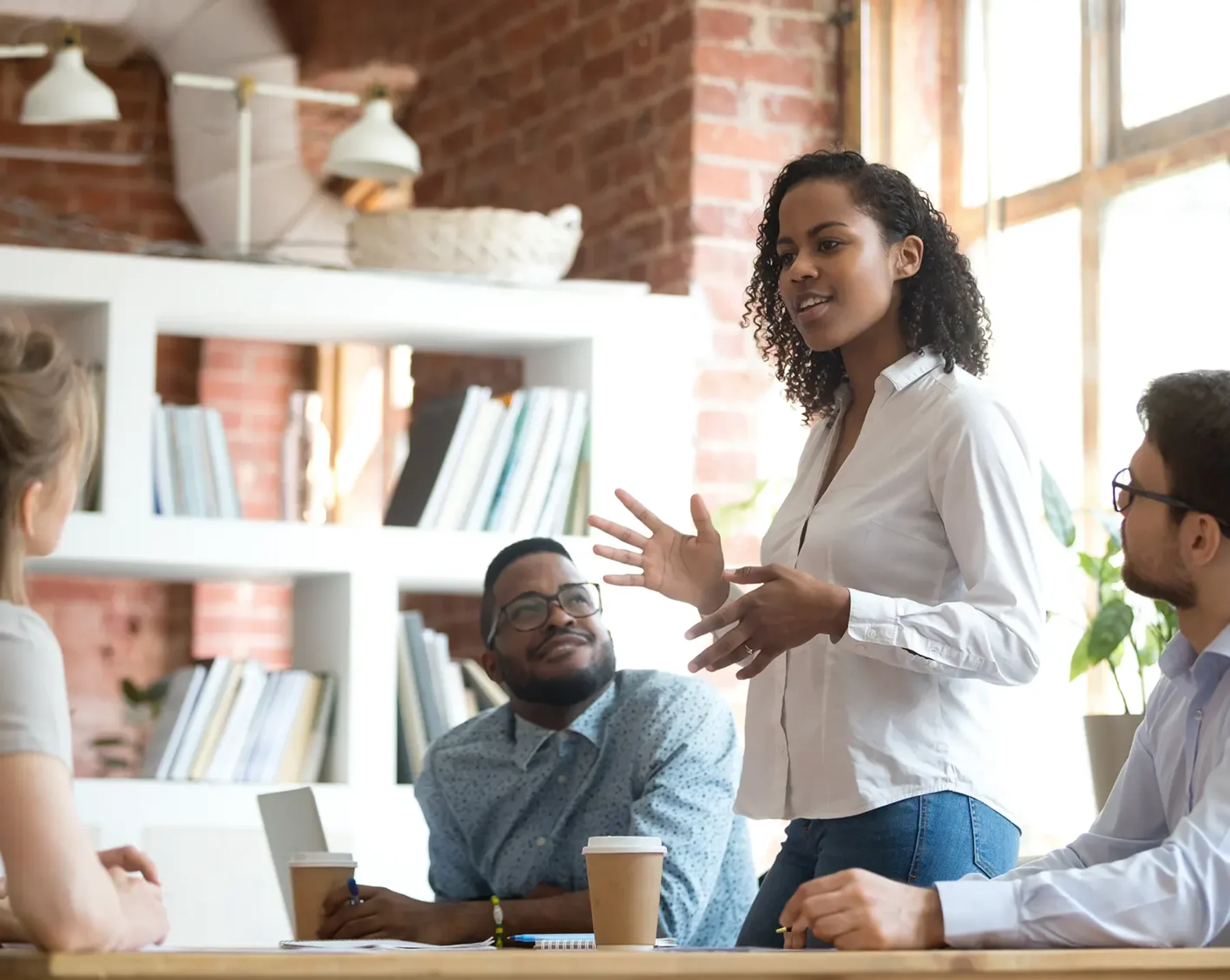hr manager talking with her team