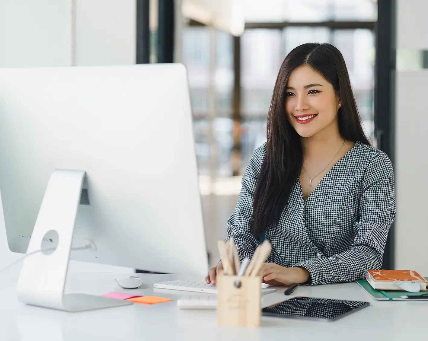 hr admin on computer looking up actionable insights