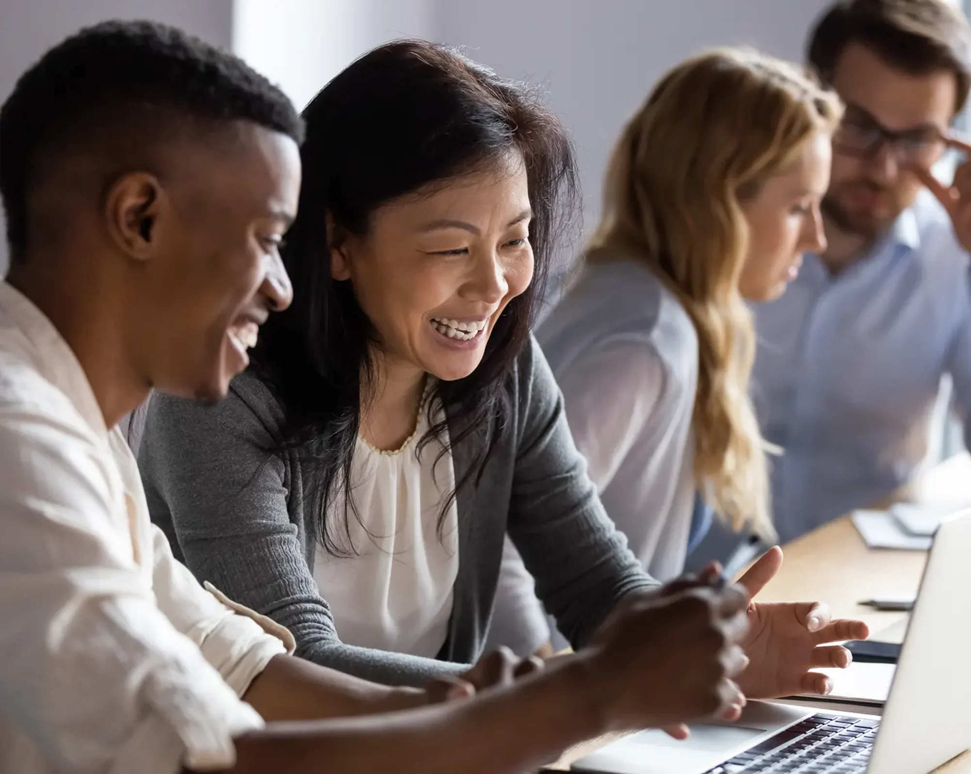 employees happily working together