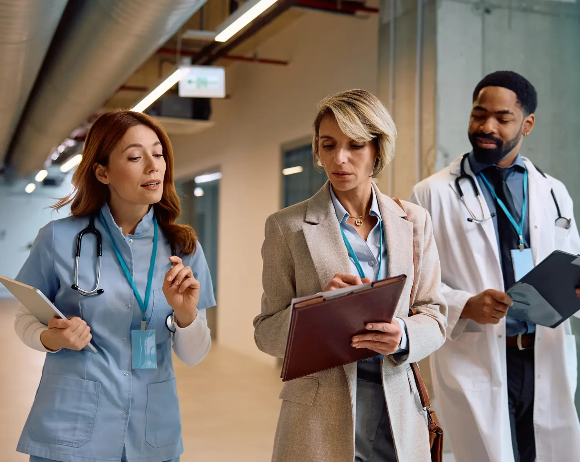 healthcare workers looking over patient notes