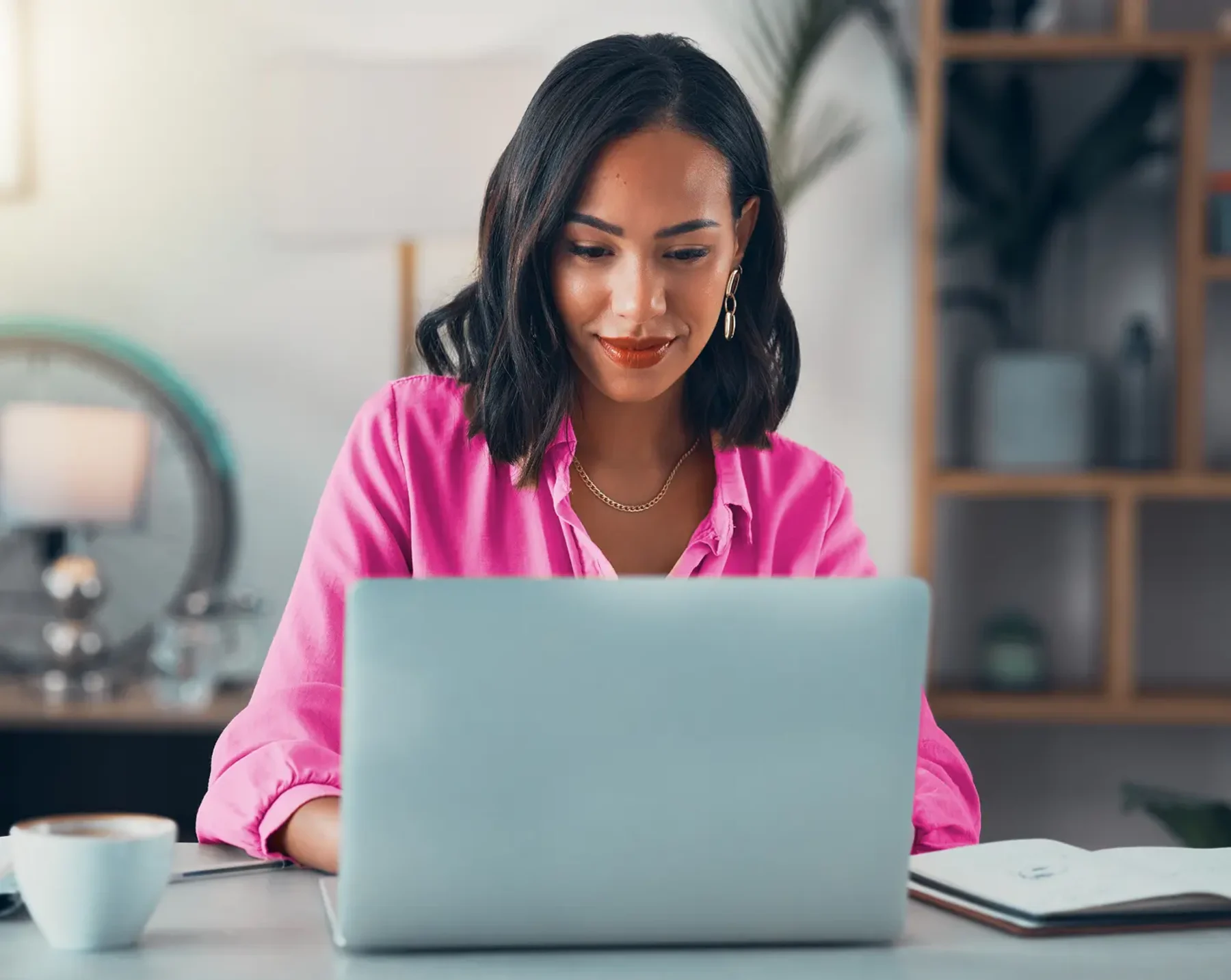 woman on computer looking for hr software
