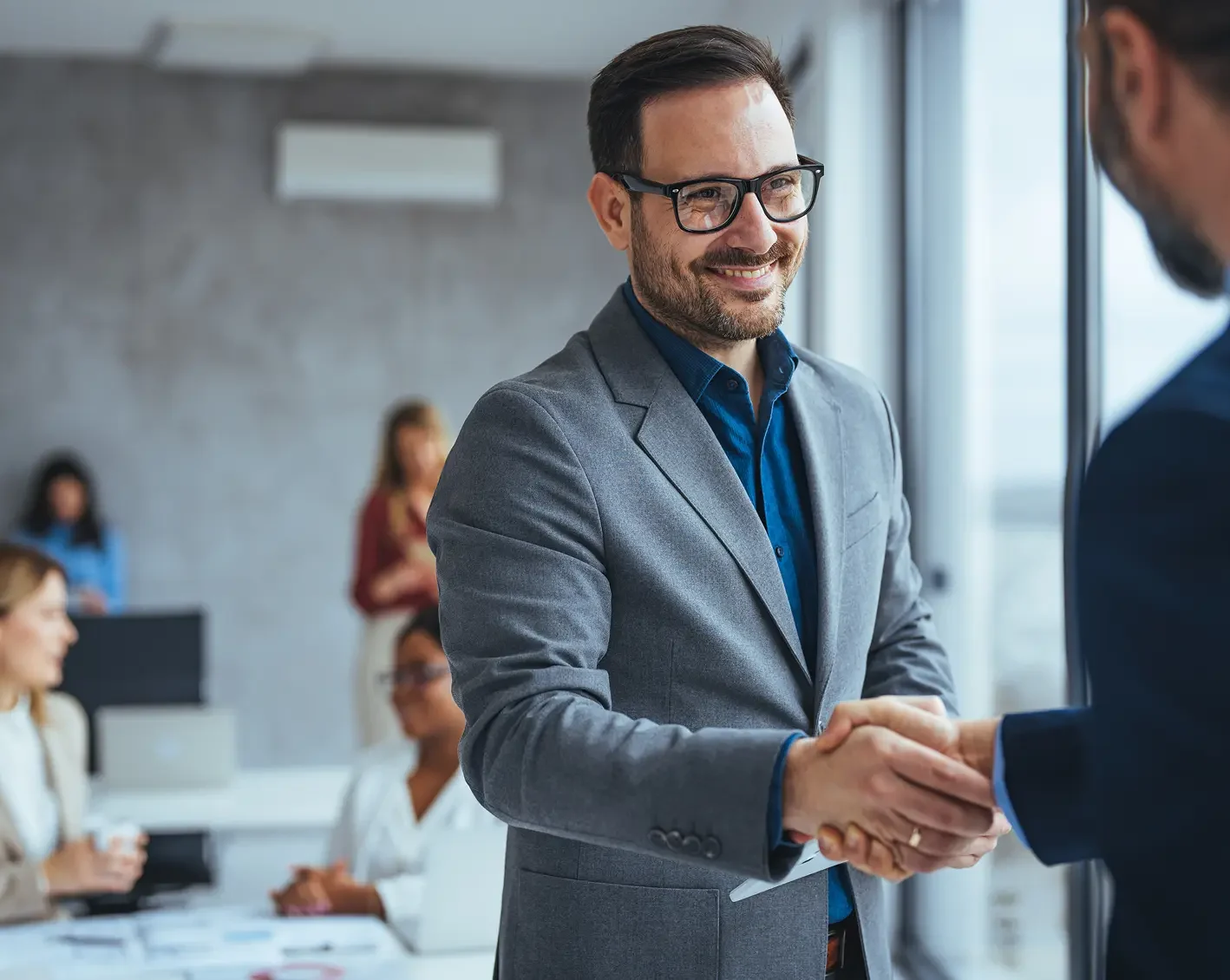 business men shaking hands on deal