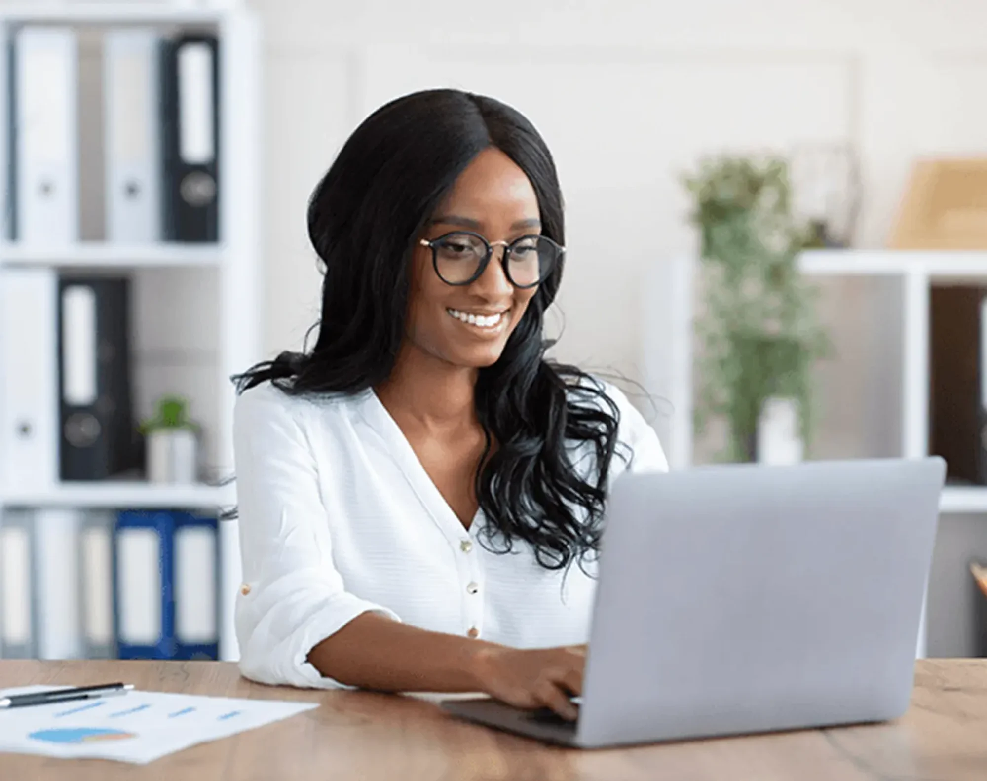business woman looking up on computer which hcm to choose