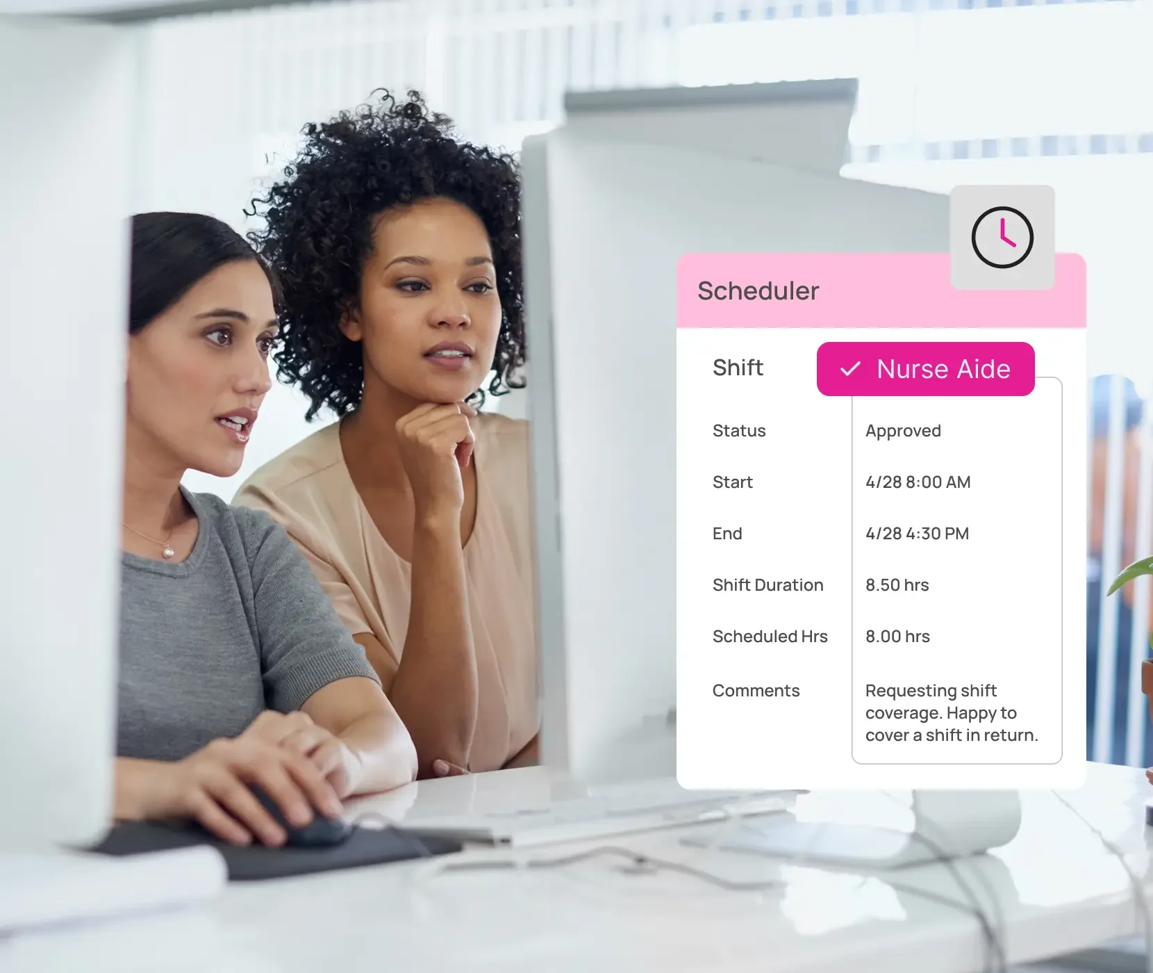women employee looking over schedule on computer