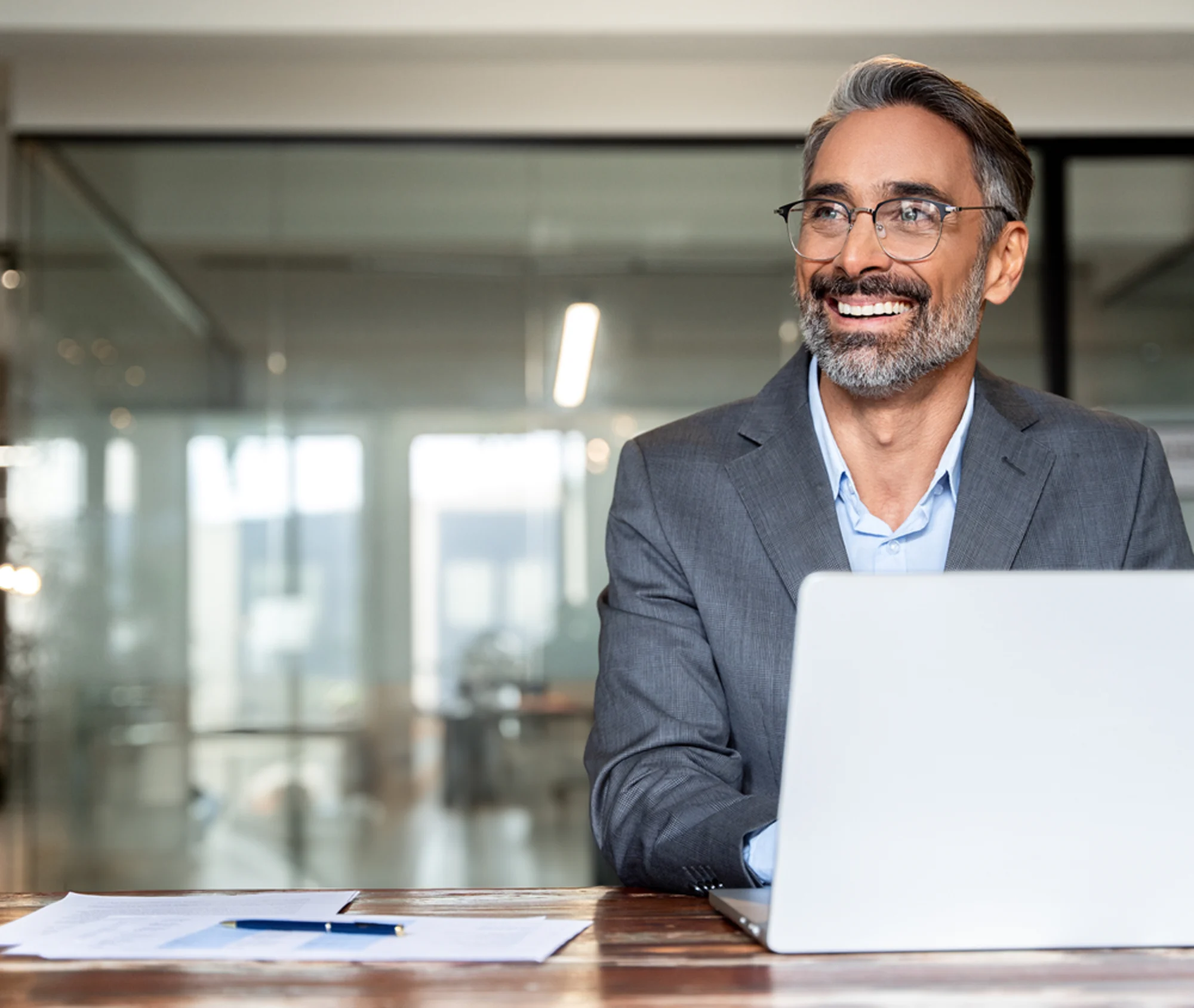 happy employee working on computer