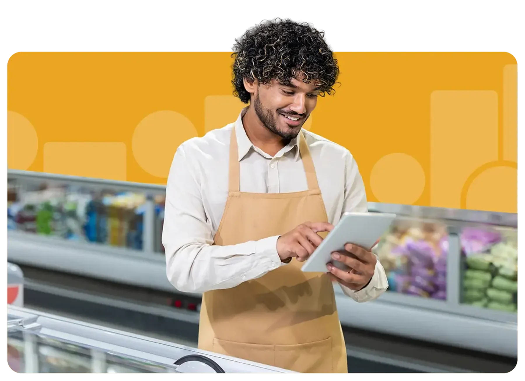 Grocery worker looking over list on tablet