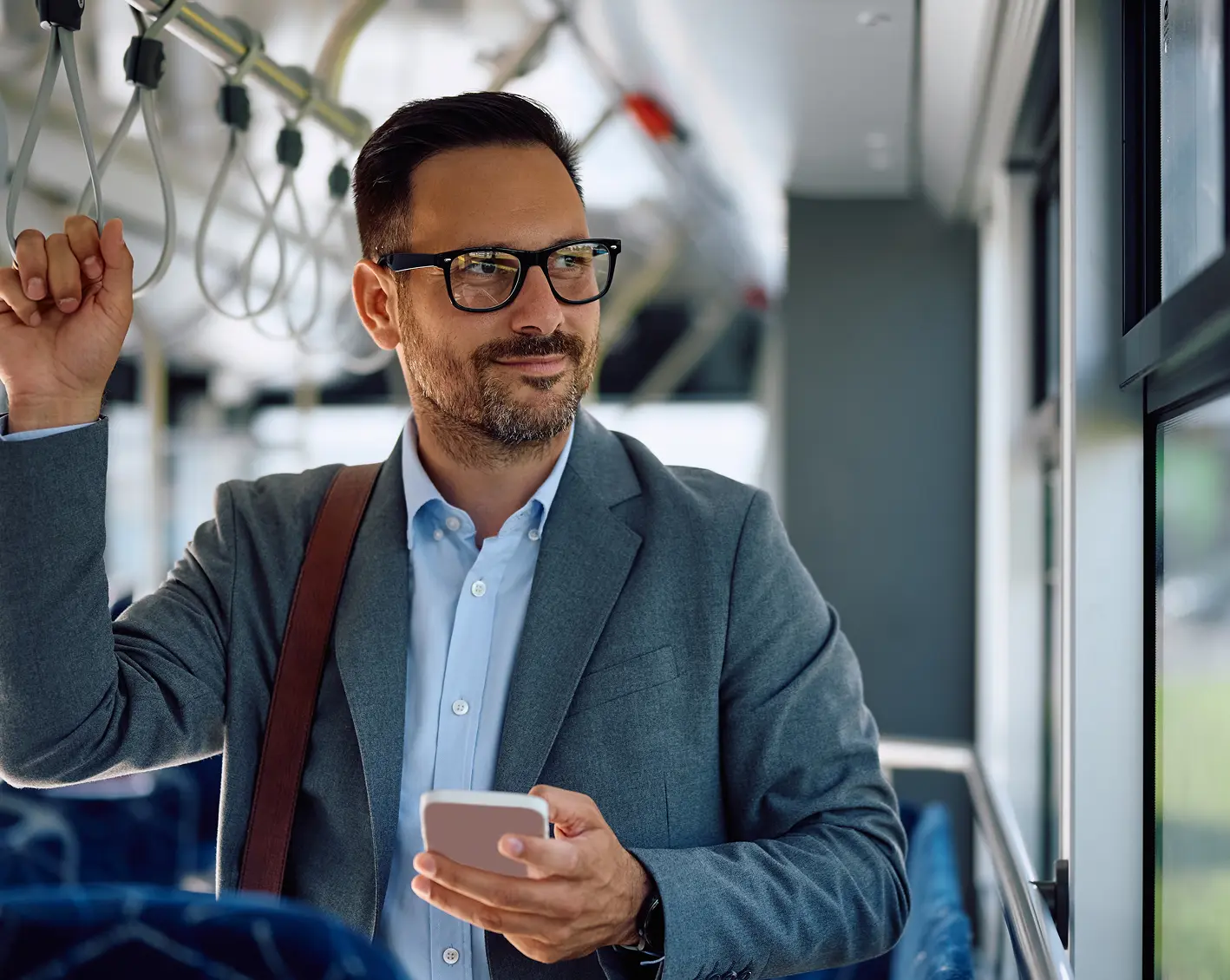 man on bus using transit parking benefits