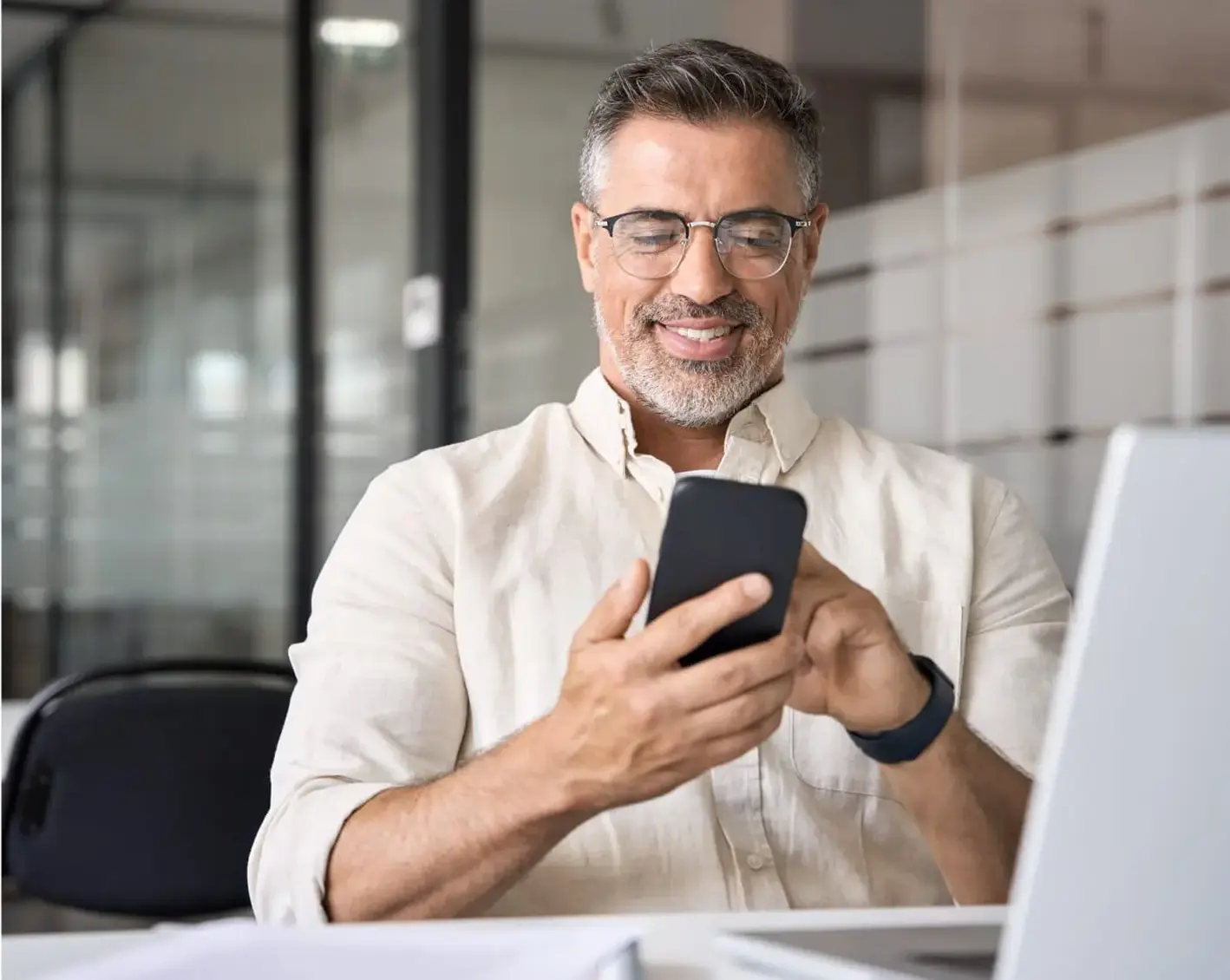 business man contacting client on his phone