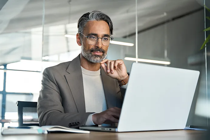Man looking at his computer 