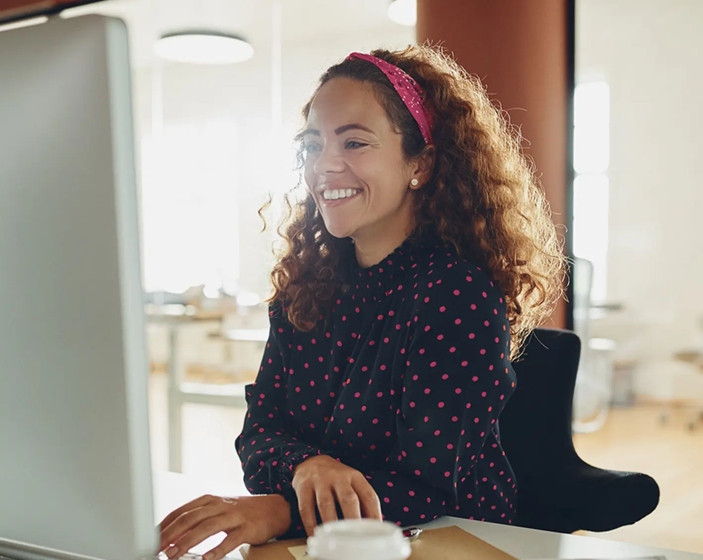 happy hr woman excited using about AI-enabled hr solutions