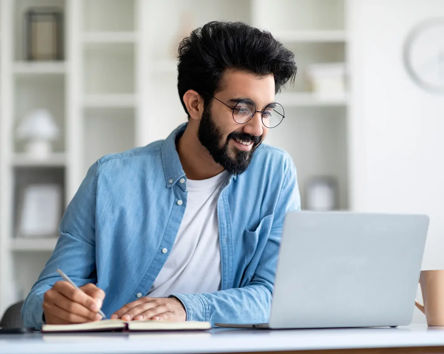 happy employee working on computer