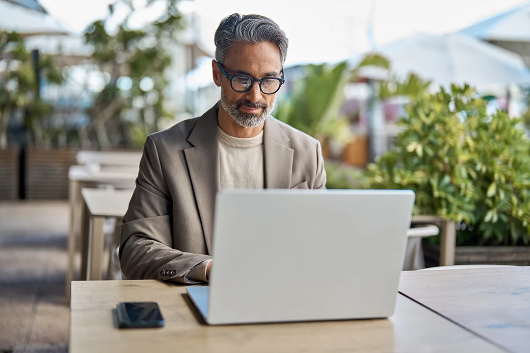 Man looking at his computer 