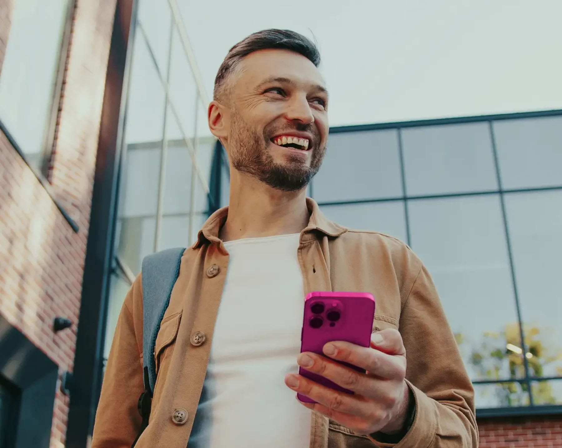 smiling employee happy about mobile access