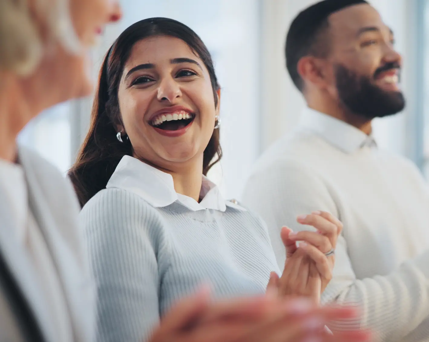 happy employees clapping