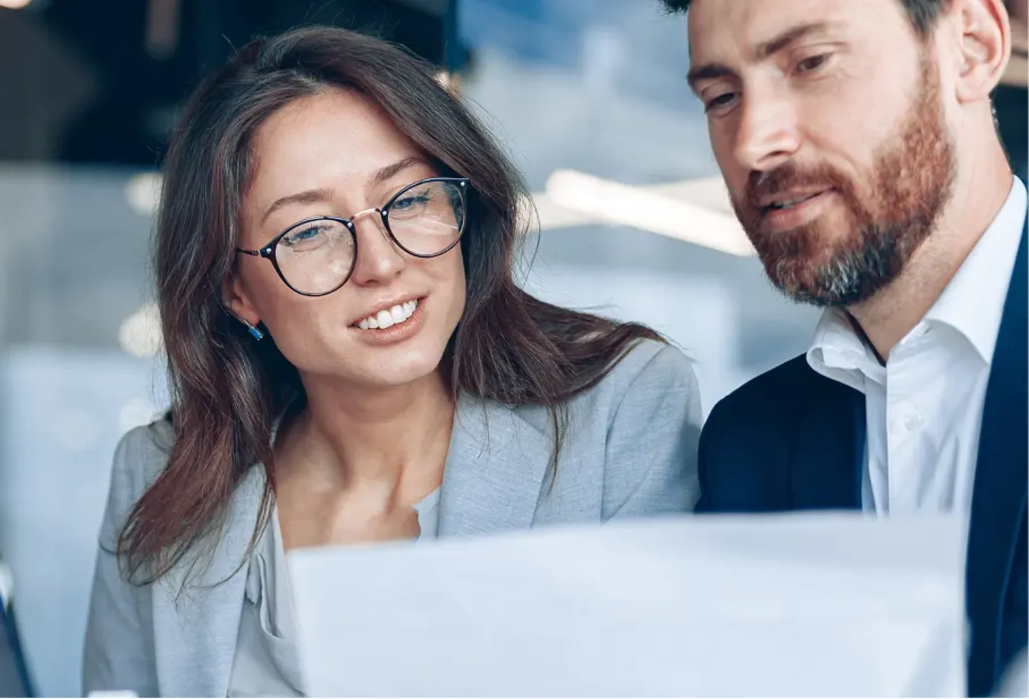 managers looking over company informaiton