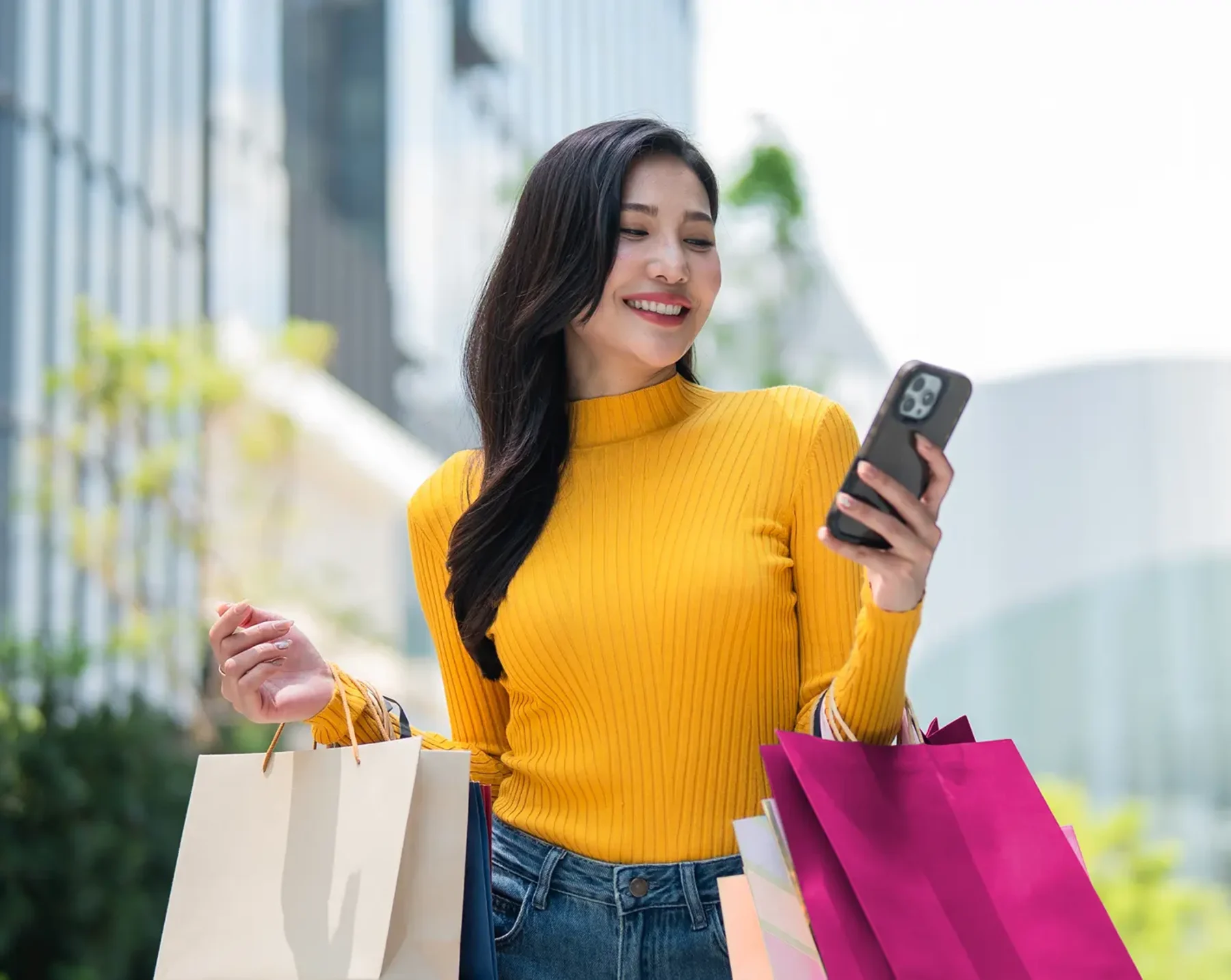 woman excited about the deals and discounts she has from company
